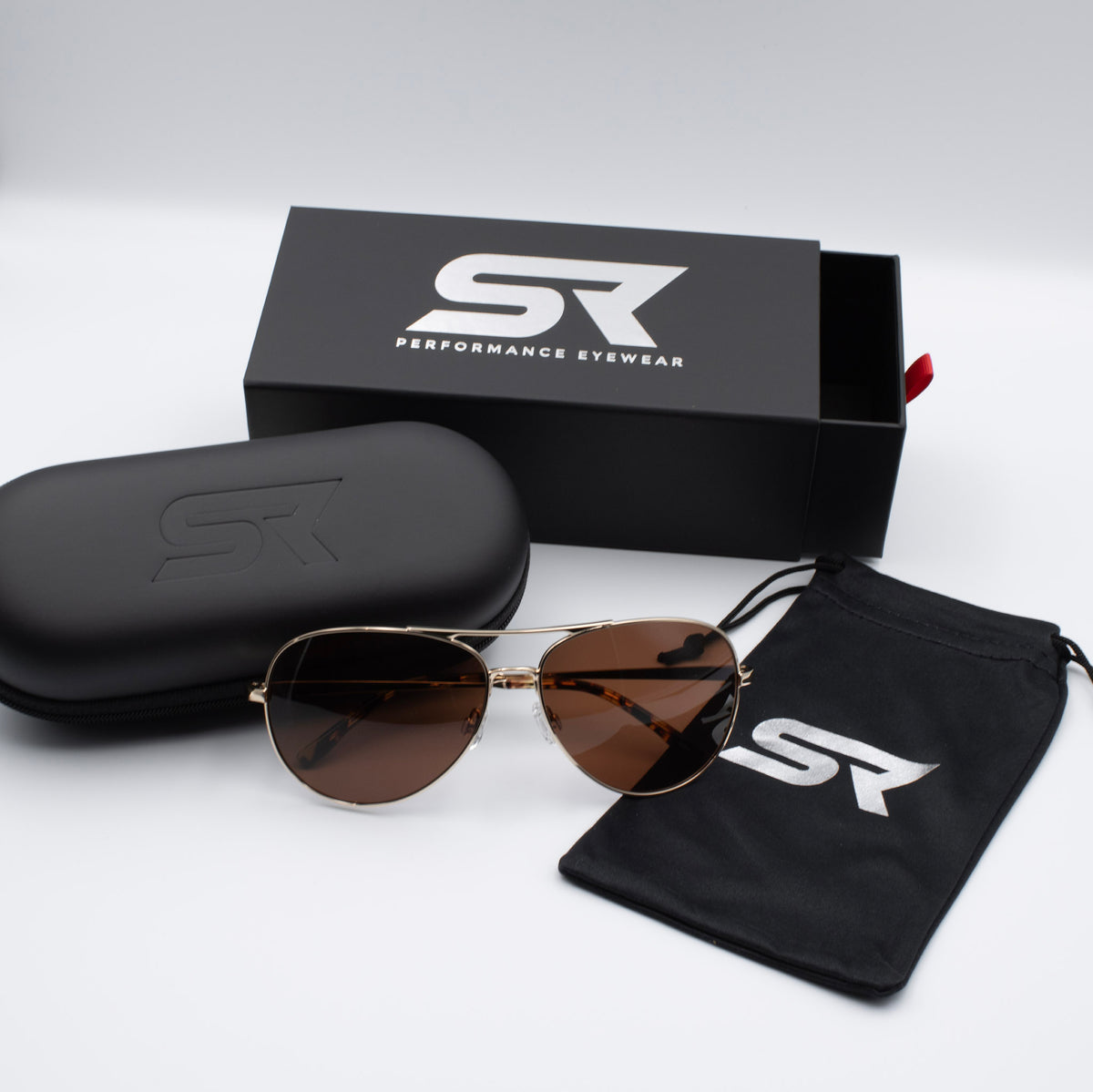 Heritage Gold Blackbird Aviator sunglasses with bronze lenses and premium SR Performance Eyewear packaging.