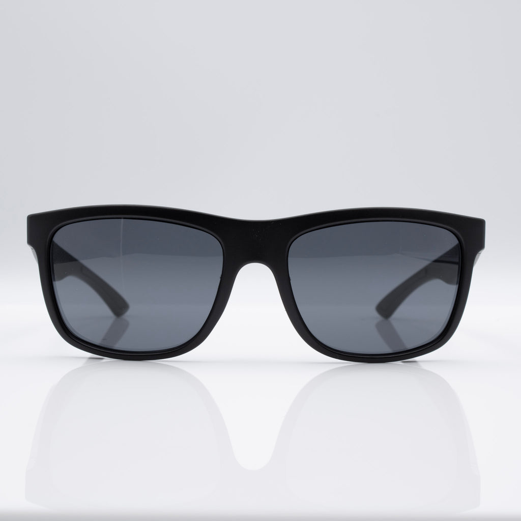 Inverted Blackout Edition sunglasses in Matte Stealth Black with gray CEVART polycarbonate lenses, clean front view.