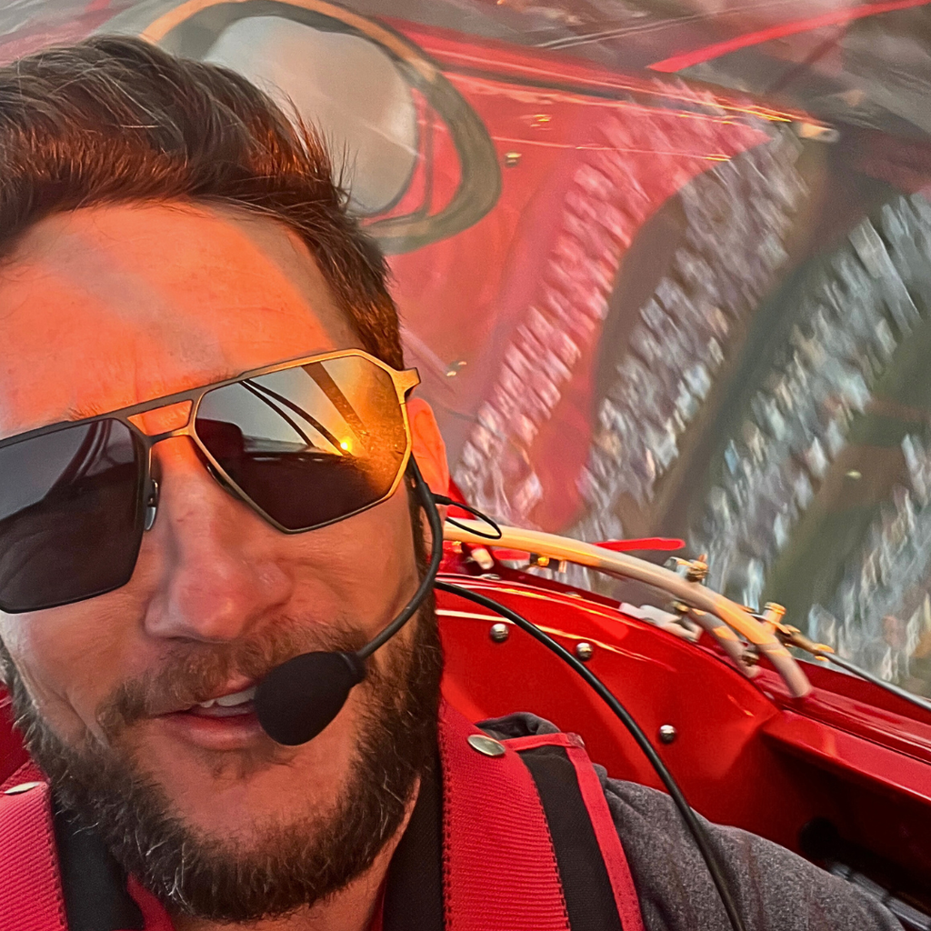 Pilot wearing SR Performance Eyewear Vector sunglasses inside an aircraft cockpit during bright flight conditions